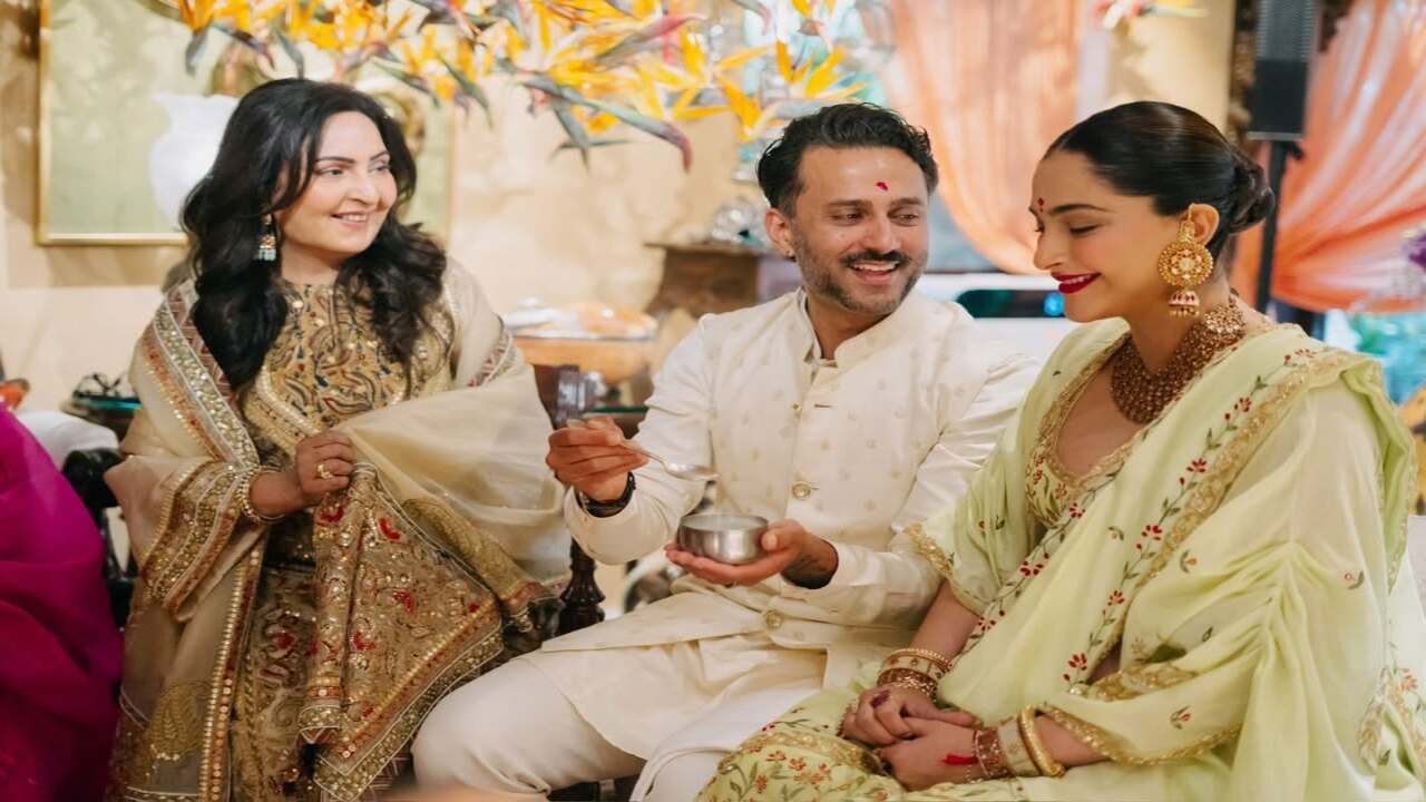 Here, she is seen seated beside her husband and her mother-in-law, Priya Ahuja during the ceremony. The husband and wife are sporting red tilaks. Anand is holding a bowl and spoon, as part of a ritual. Celebs like Kareena Kapoor, Shabana Azmi were also in attendance